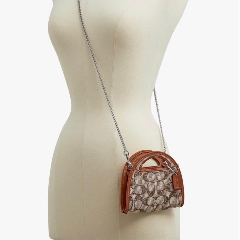 Top Handle Card Case
In Crystal Signature Jacquard NWT
Coach - Picture 4 of 5